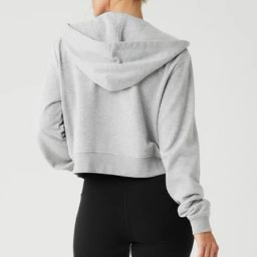 ALO Yoga Routine Cropped Zip Hoodie Jacket in Athletic Heather Grey - Picture 3 of 13